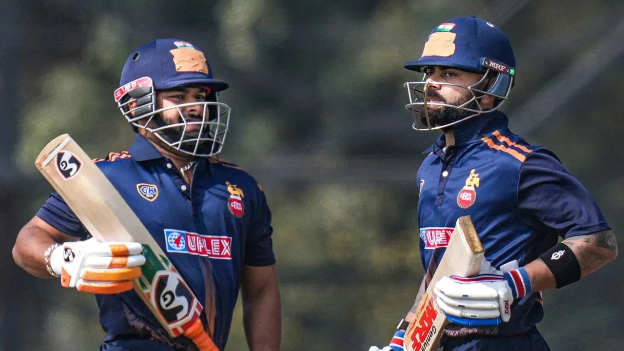 Kohli Dominates Gujarat with Explosive 77